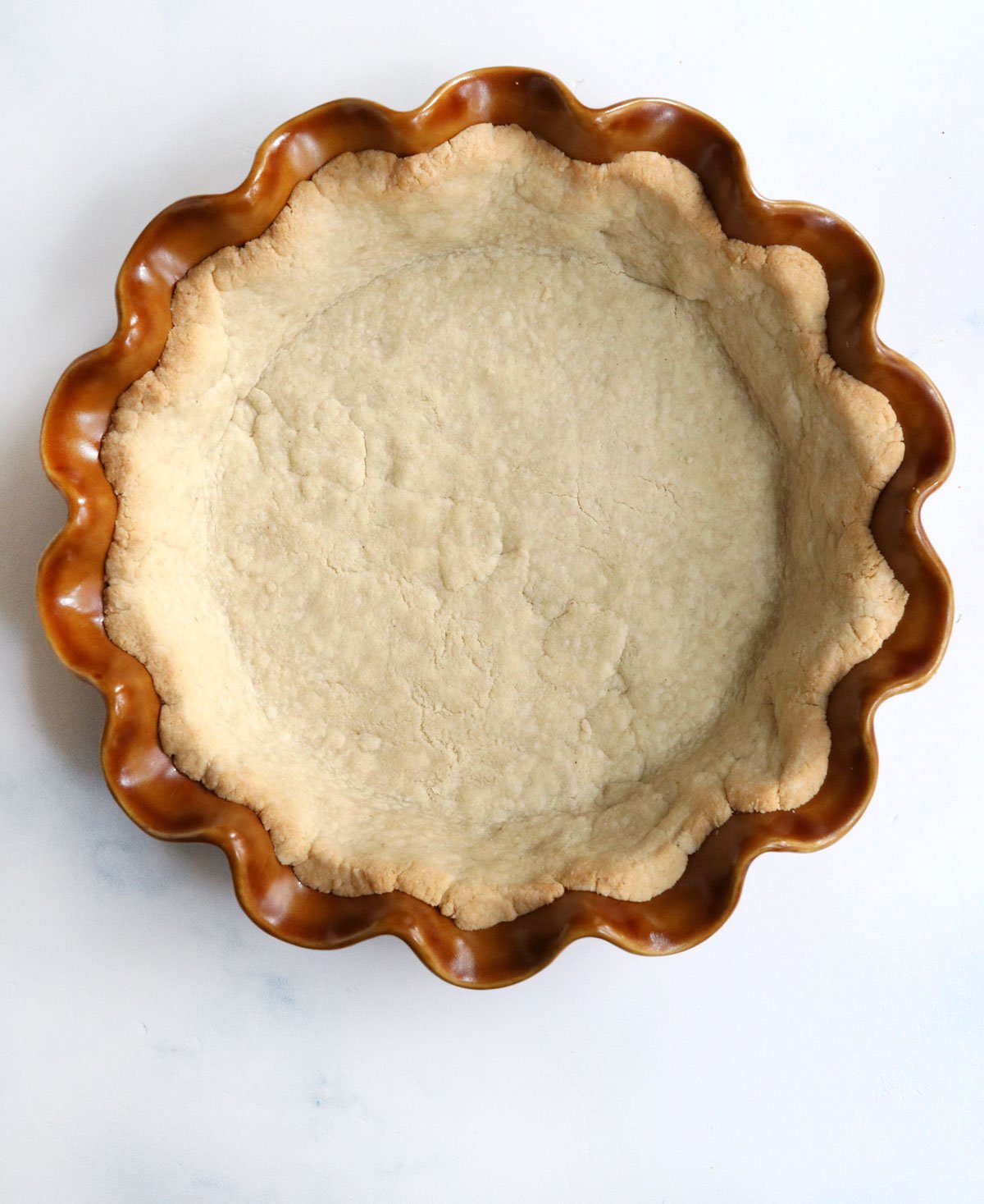 almond flour pie crust in fluted pan