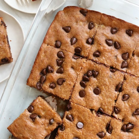 banana snack cake sliced in pan.