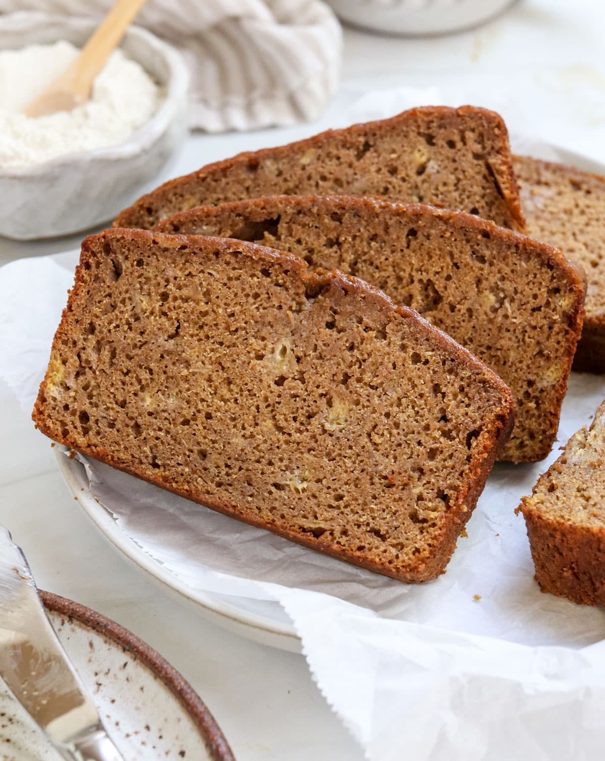 buckwheat banana bread slices on plate.