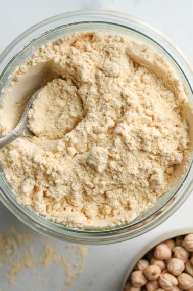 chickpea flour overhead in glass storage jar