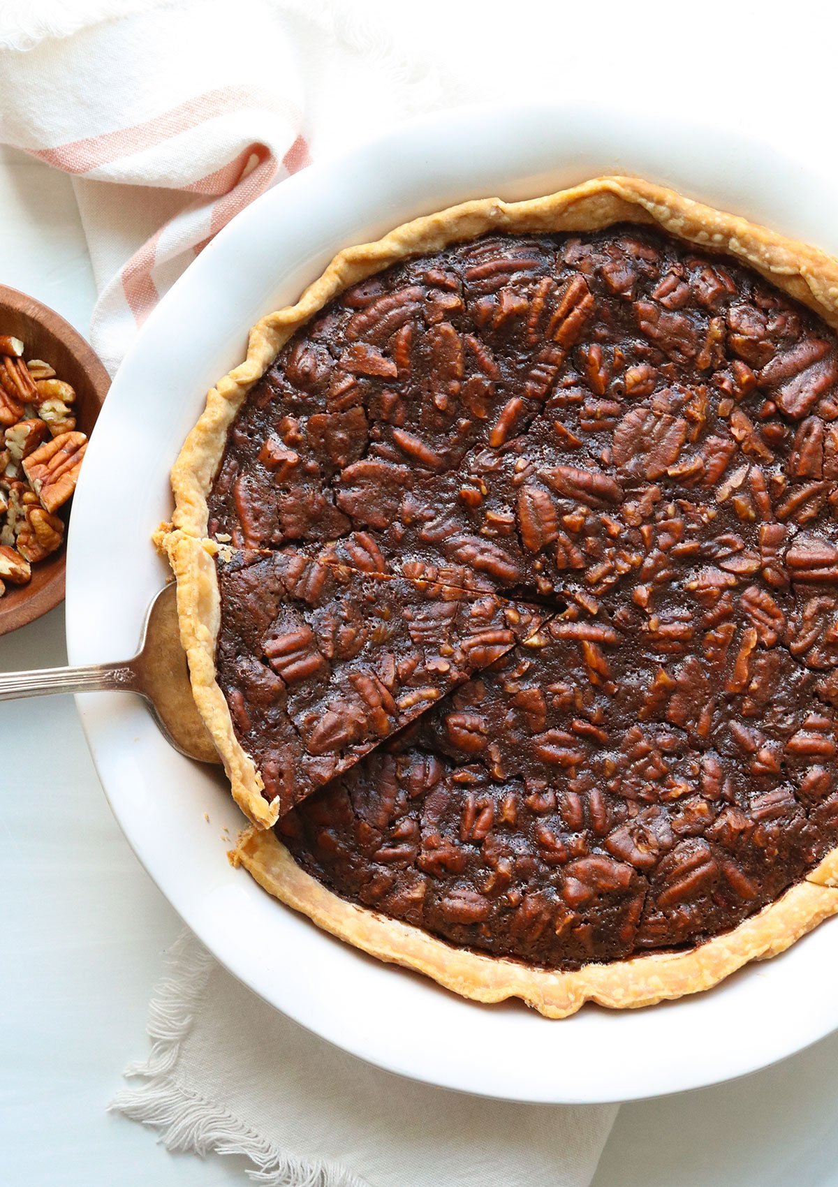 chocolate pecan pie sliced overhead.