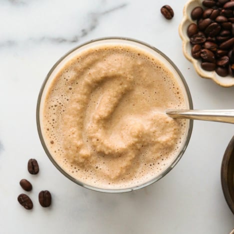 Slushy coffee smoothie overhead in a glass.