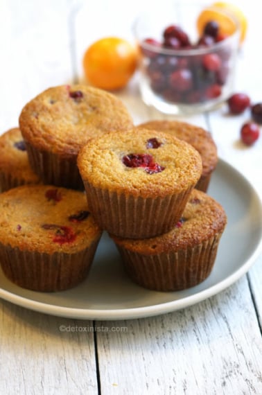 Plate of orange cranberry coconut flour muffins