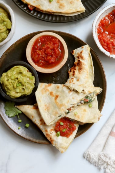 quesadilla eaten on black plate