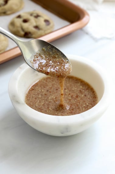 flax egg dripping off a spoon.