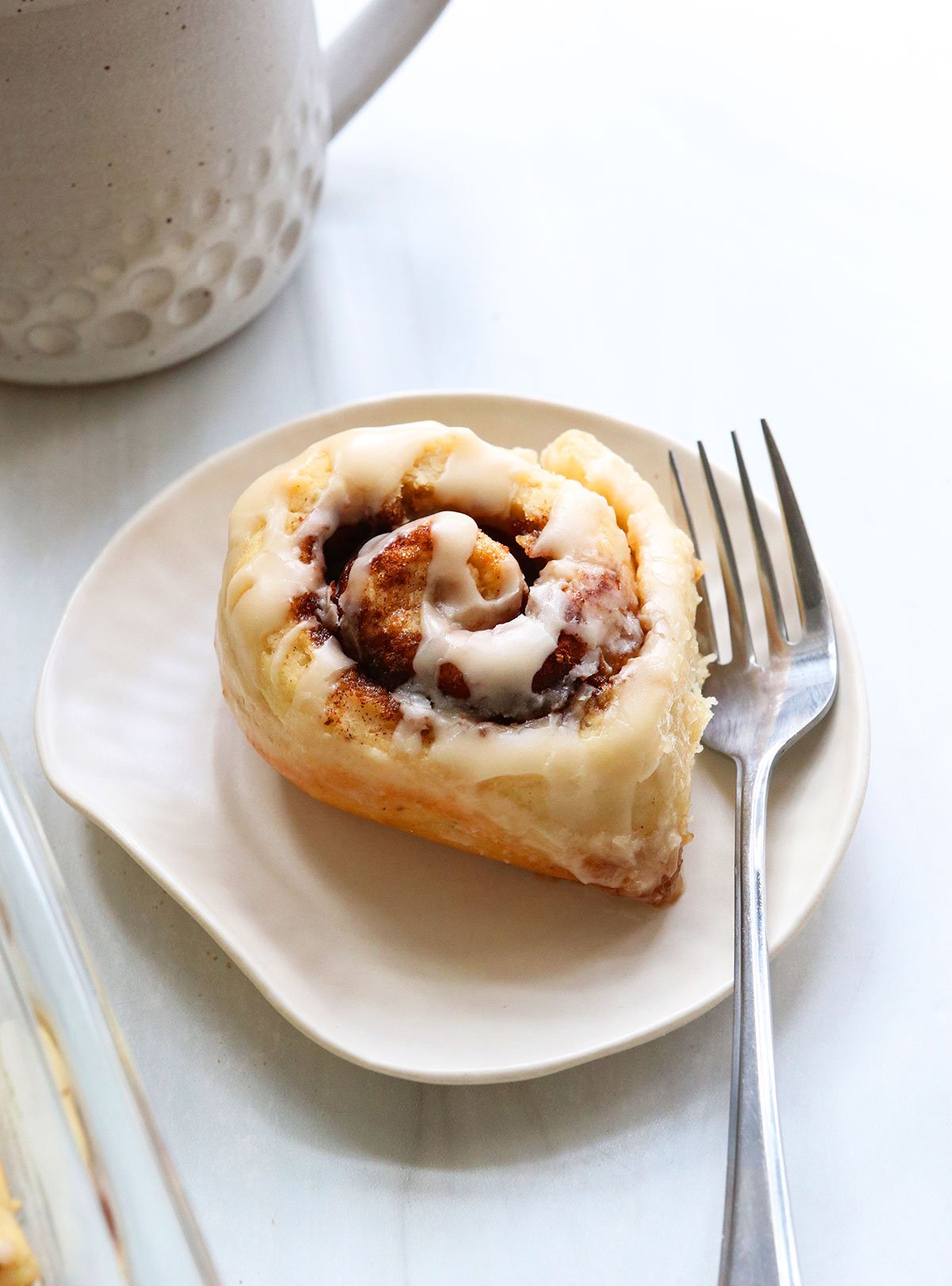 gluten-free cinnamon roll on a plate