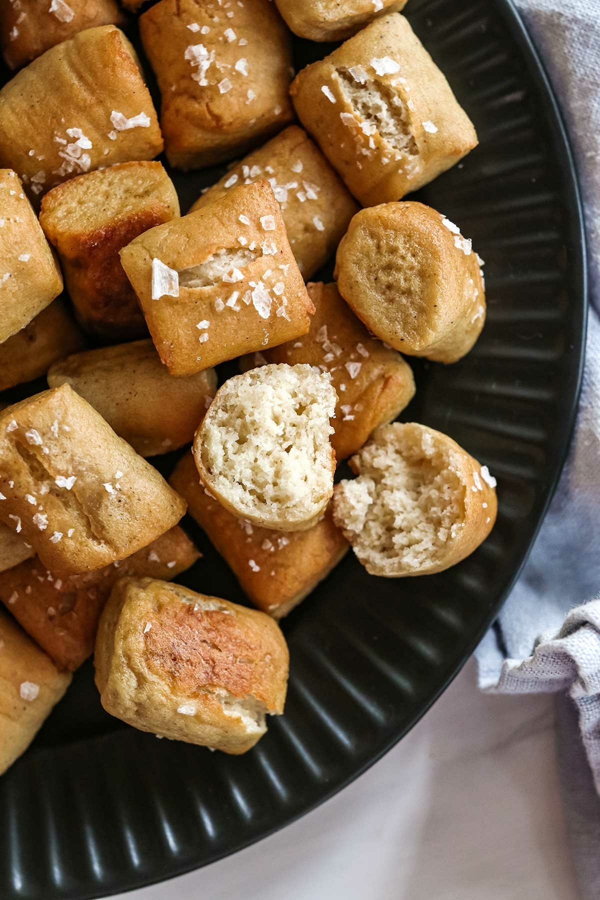 pretzel bite split in half to show soft texture.