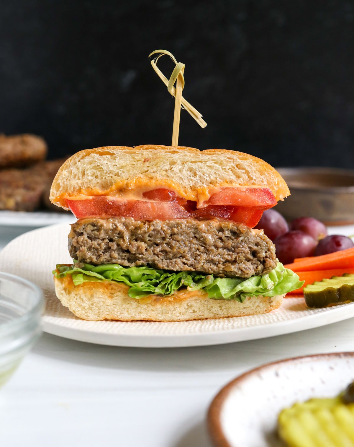 healthy burger sliced in half with toothpick.