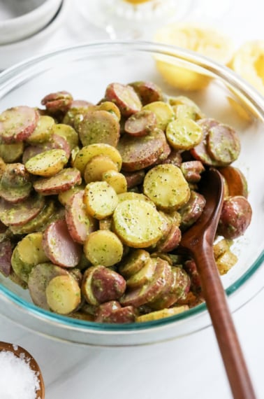 healthy potato salad in glass bowl.