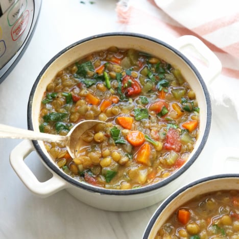 instant pot lentil soup served in white bowl.