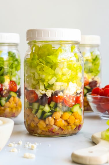 Mediterranean salad in a mason jar for meal prep.