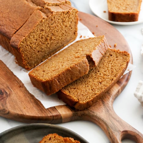 oat flour pumpkin bread sliced on board