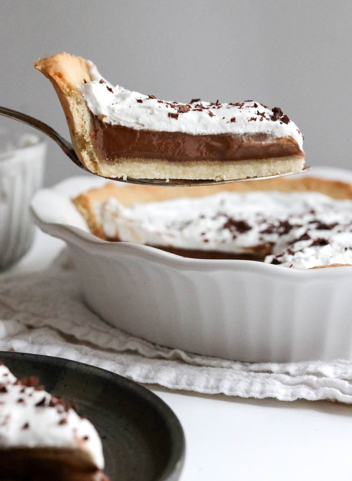 slice of pie with almond flour pie crust lifted