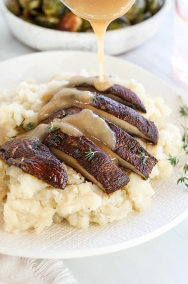 gravy added to portobello mushrooms.