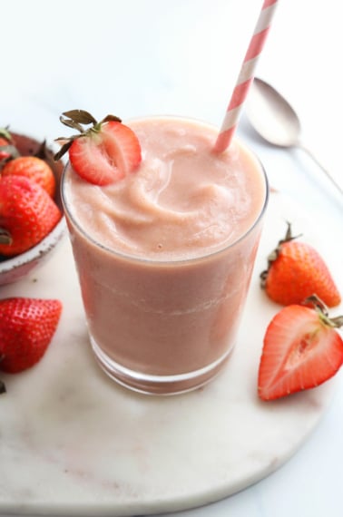 strawberry smoothie with strawberry on top