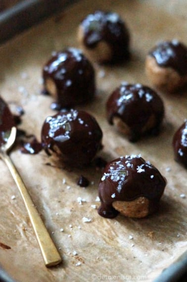 salted peanut butter truffles on parchment paper