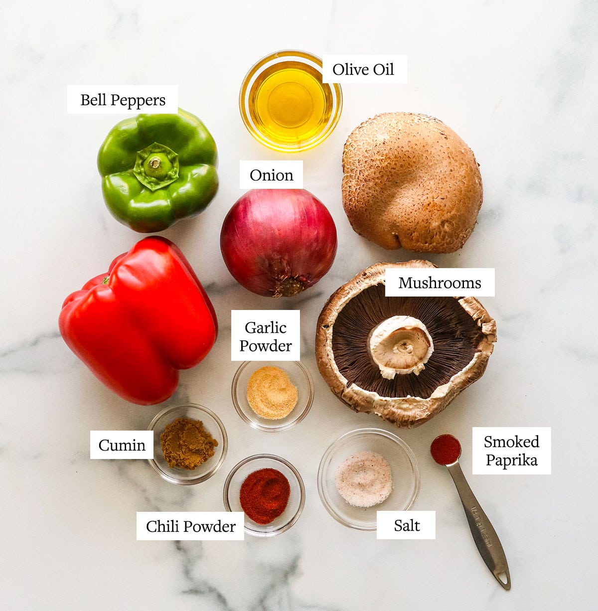 Vegan Fajita ingredients labeled on a marble surface.