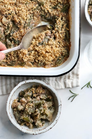 vegan green bean casserole with spoon inside