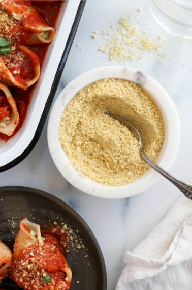 vegan parmesan cheese in white bowl