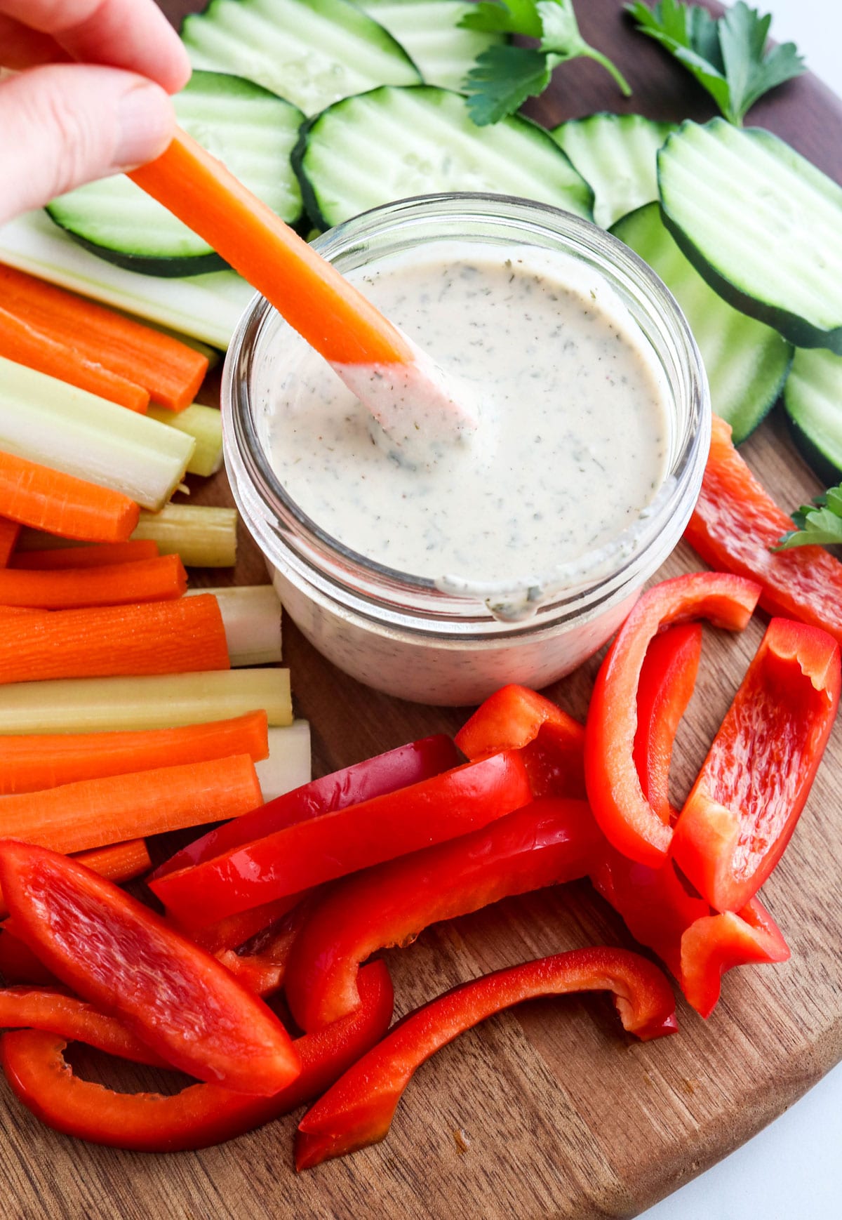 carrot dipped in vegan ranch dressing