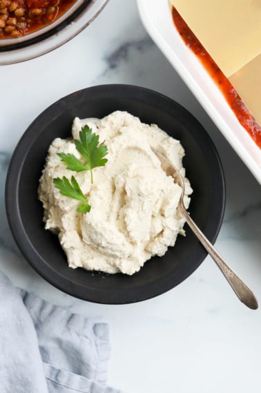 vegan ricotta in a black bowl