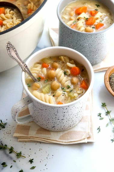 chickpea noodle soup in 2 mugs